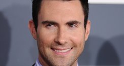 Adam Levine arrives at the Grammy Awards 2012
