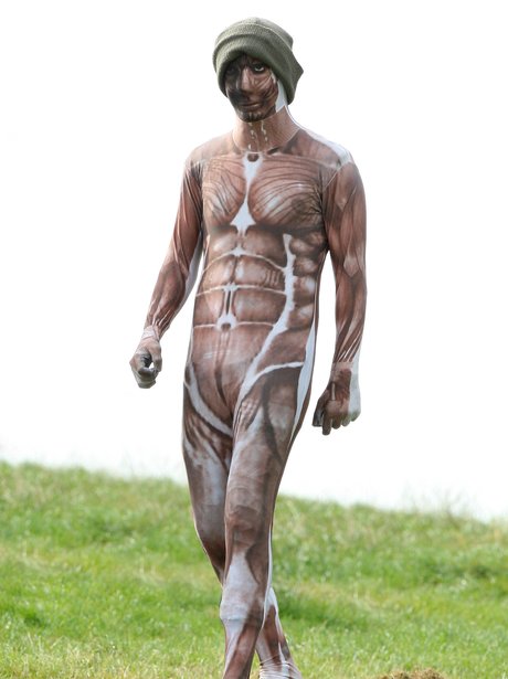 Harry Styles Rocks Muscle Morphsuit During Afternoon Out In London