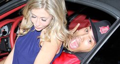 Chris Brown poses with a mystery blond girl