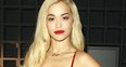 Rita Ora wearing a PVC dress