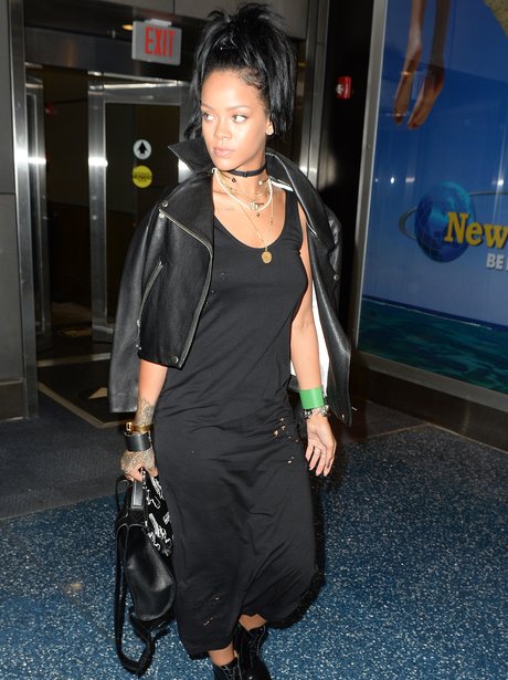 Lookin' sexy, RiRi! The Bajan star goes for another sheer style dress ...